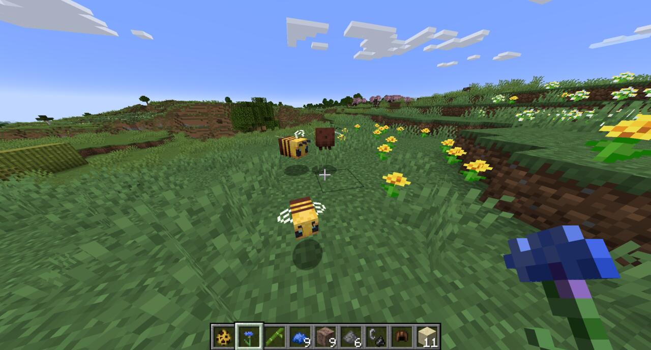 A baby bee being bred in Minecraft