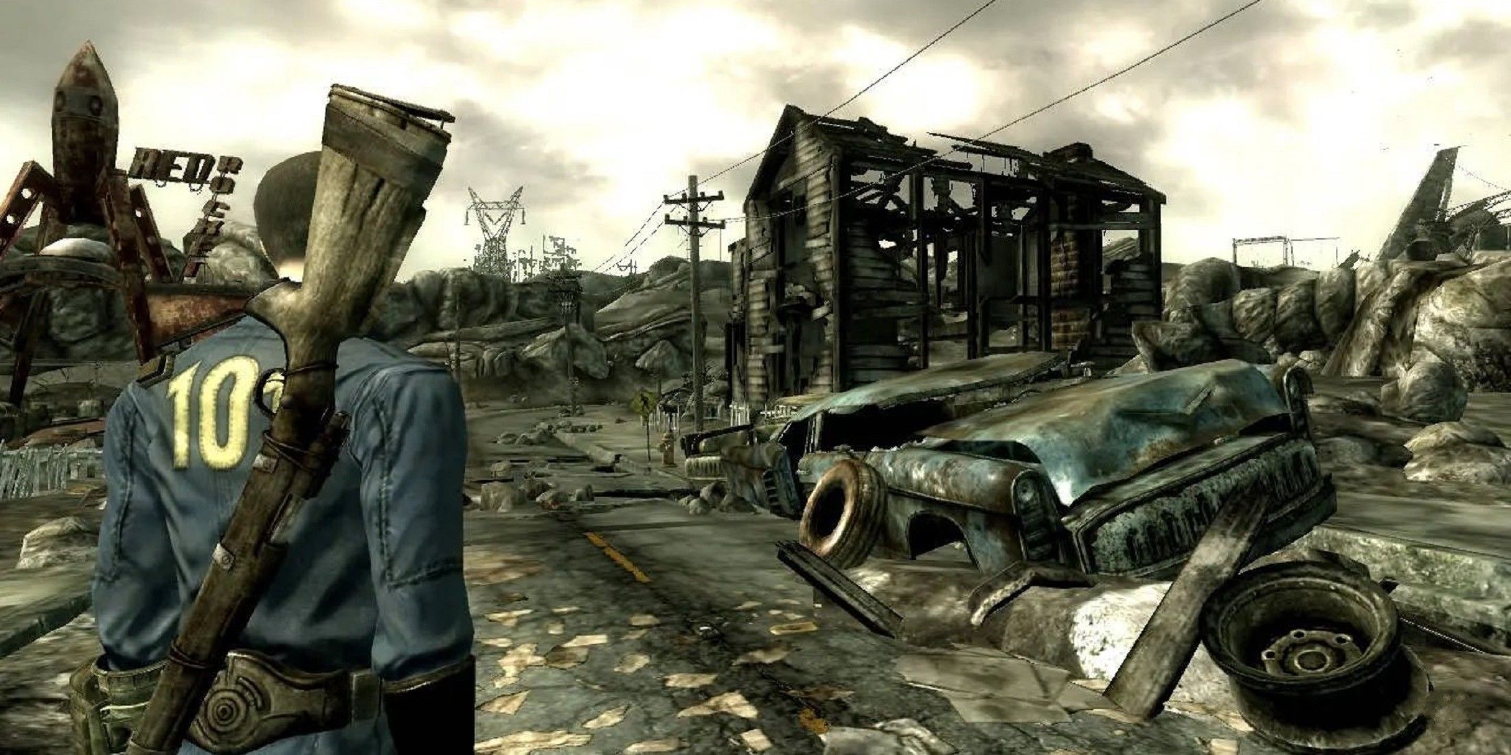 Lone Wanderer standing in the middle of a ruined town