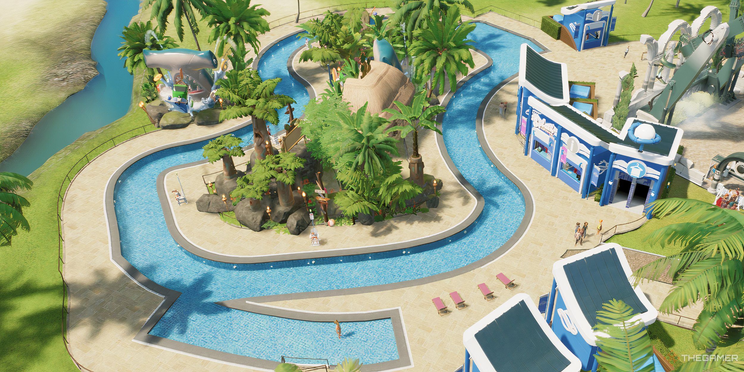 Aerial view of a lazy river with palm trees.