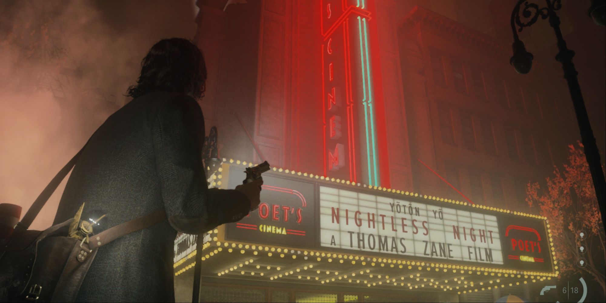 Alan standing outside of the cinema theater with Thomas Zane's Nightless Night on the Marquee.