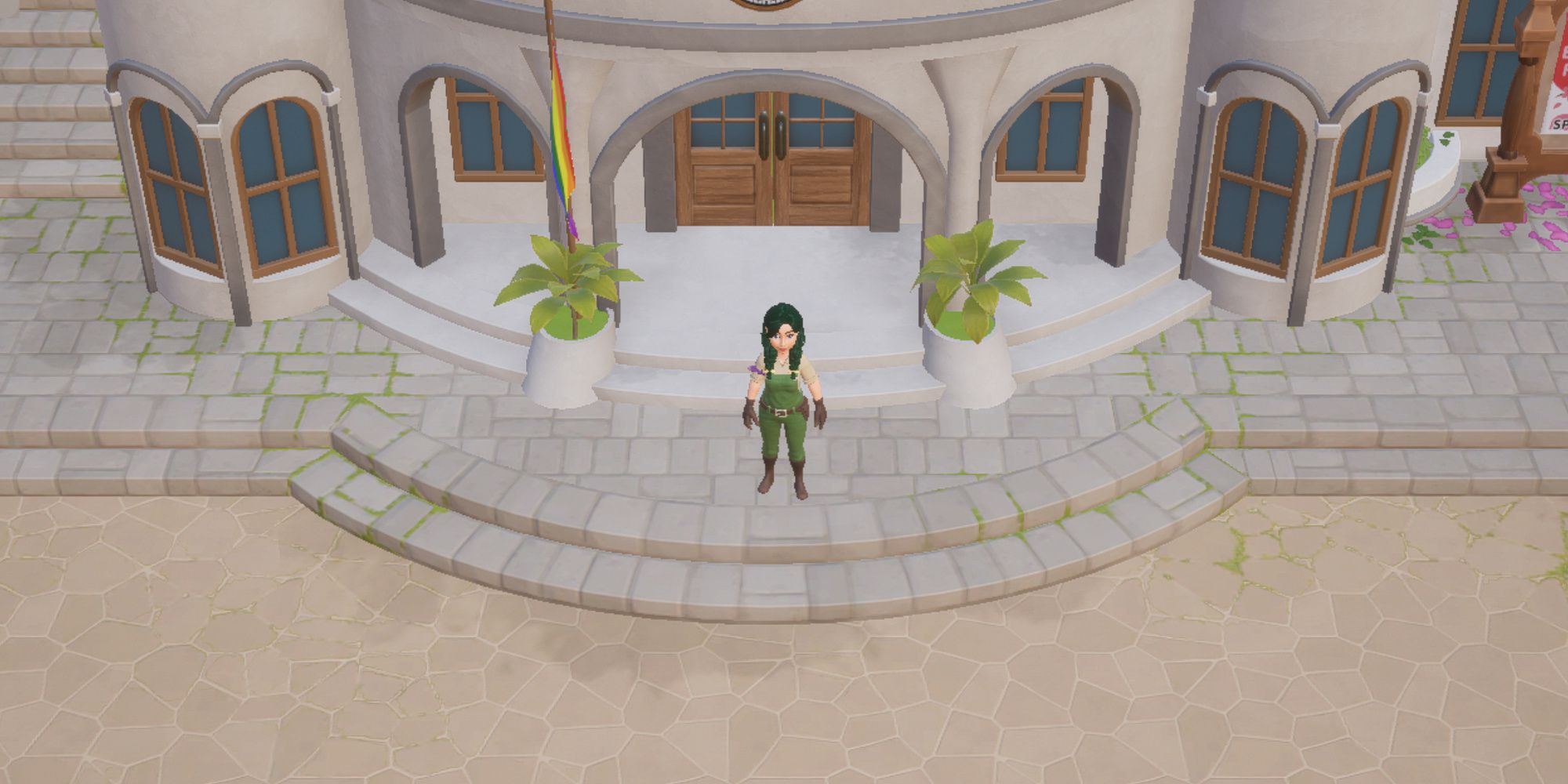 Coral Island screenshot of the farmer standing outside of town hall during the daytime.