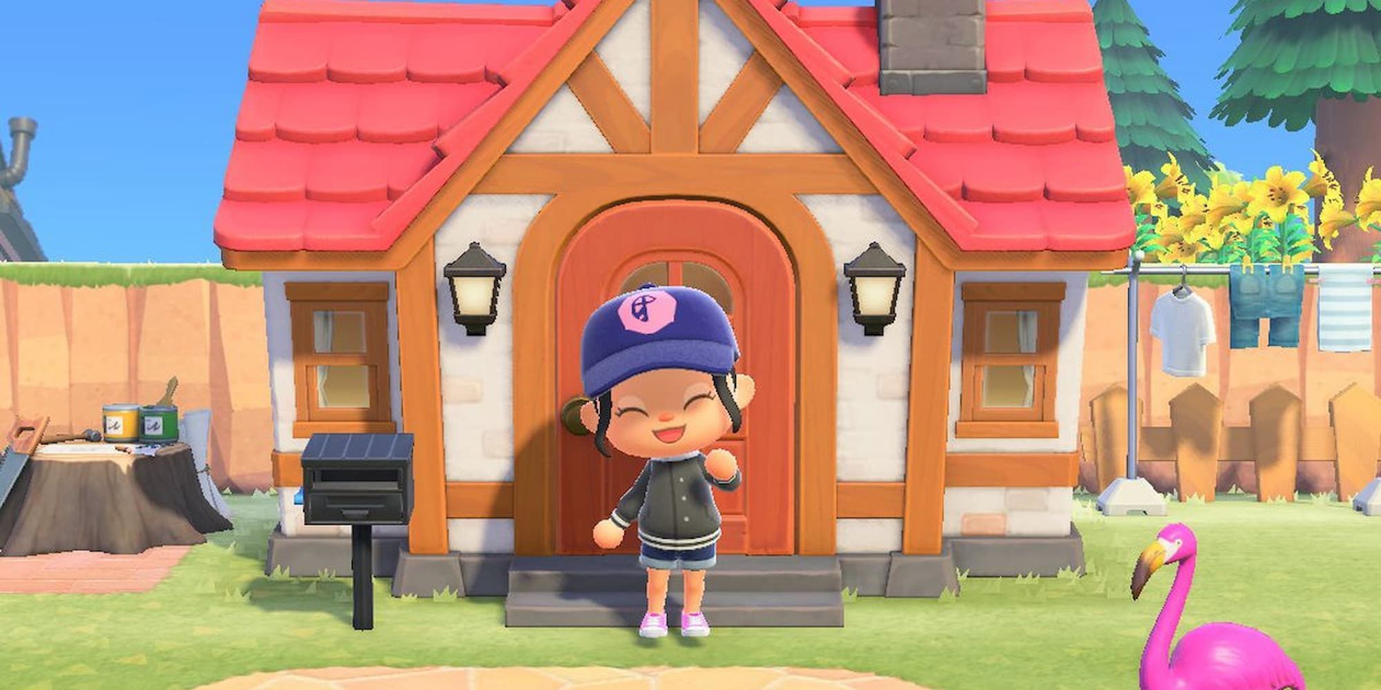 The Animal Crossing: New Horizons character smiles in front of her home.