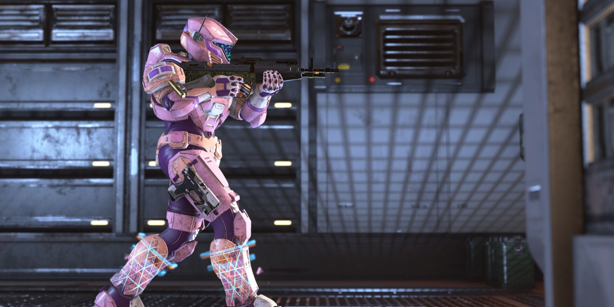 pink spartan aiming a gun in halo infinite.