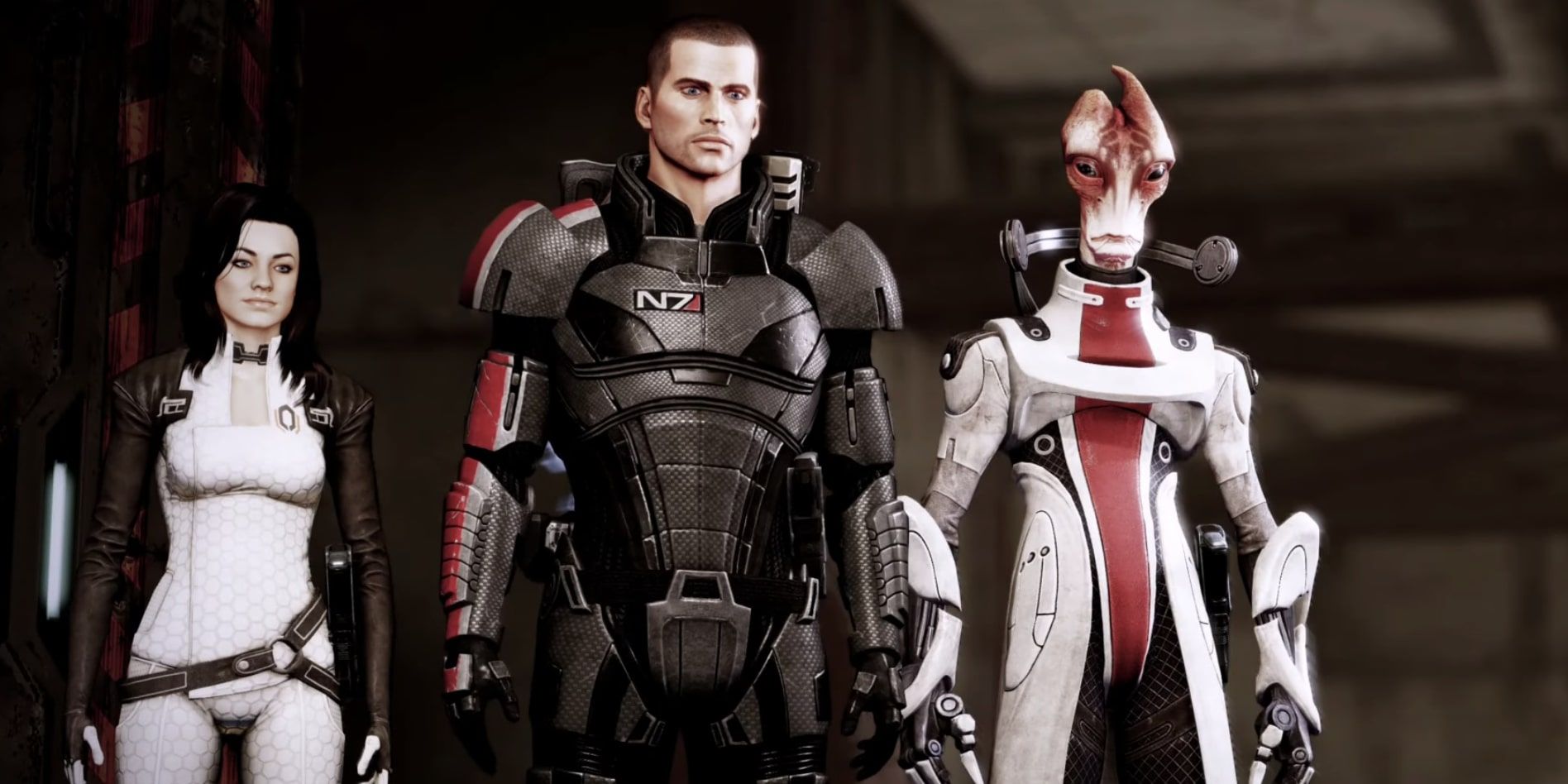 Mass Effect 2 screenshot of Male Shepard standing next to Miranda and Mordin. 