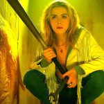 Best Amazon Prime horror movies: Kiernan Shipka as Jamie Hughes holding a bat and a wrench during the movie Totally Killer.