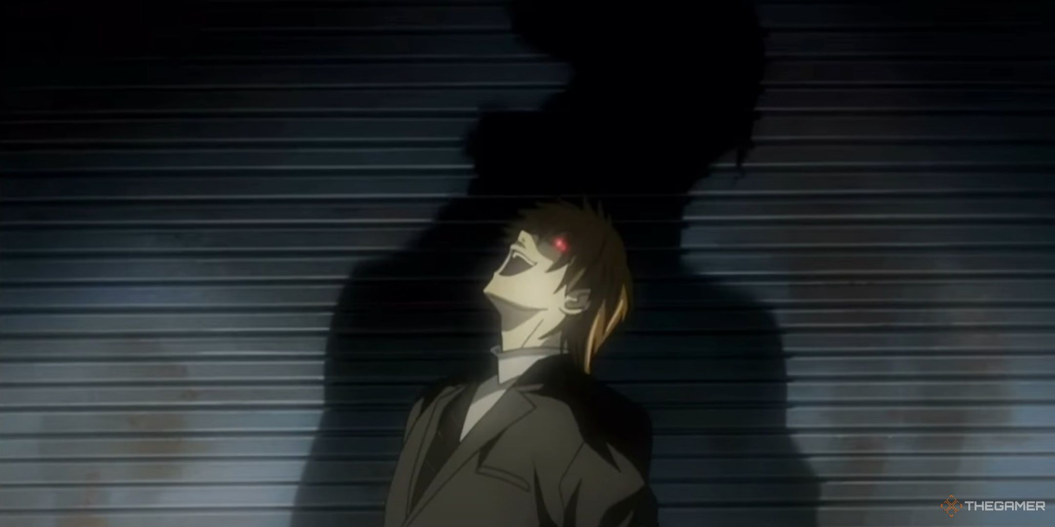 Light Yagami laughs as his identity as Kira is revealed in the Death Note anime.