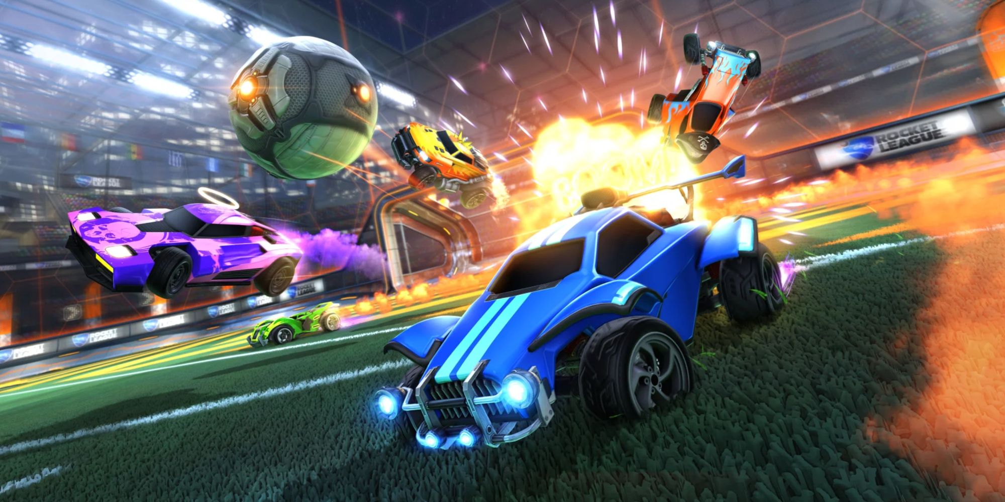 Chaotic game of Rocket League with five cars, the ball and an explosion in Rocket League.