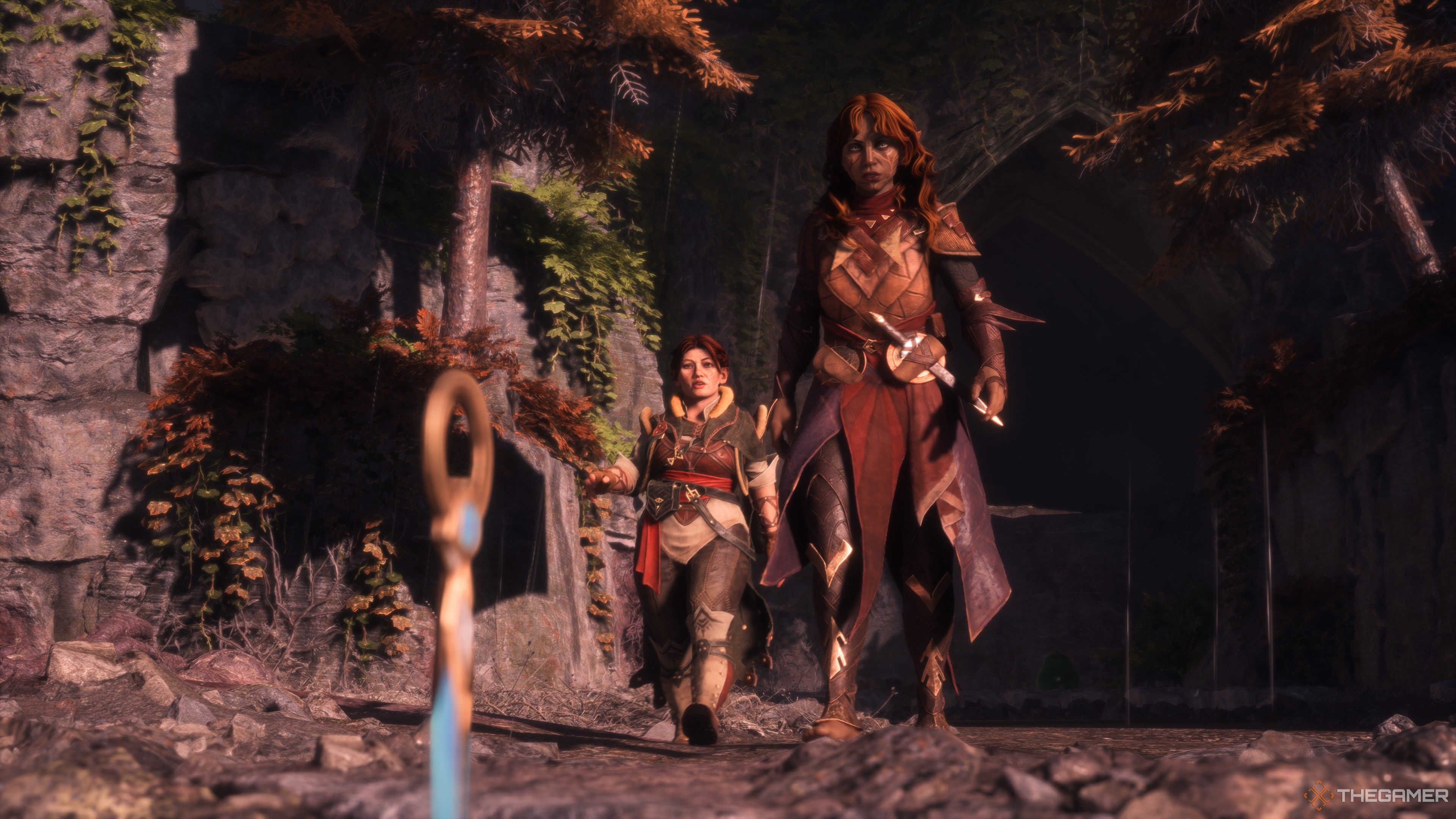 Rook and Harding in Dragon Age: The Veilguard walking towards a dagger.