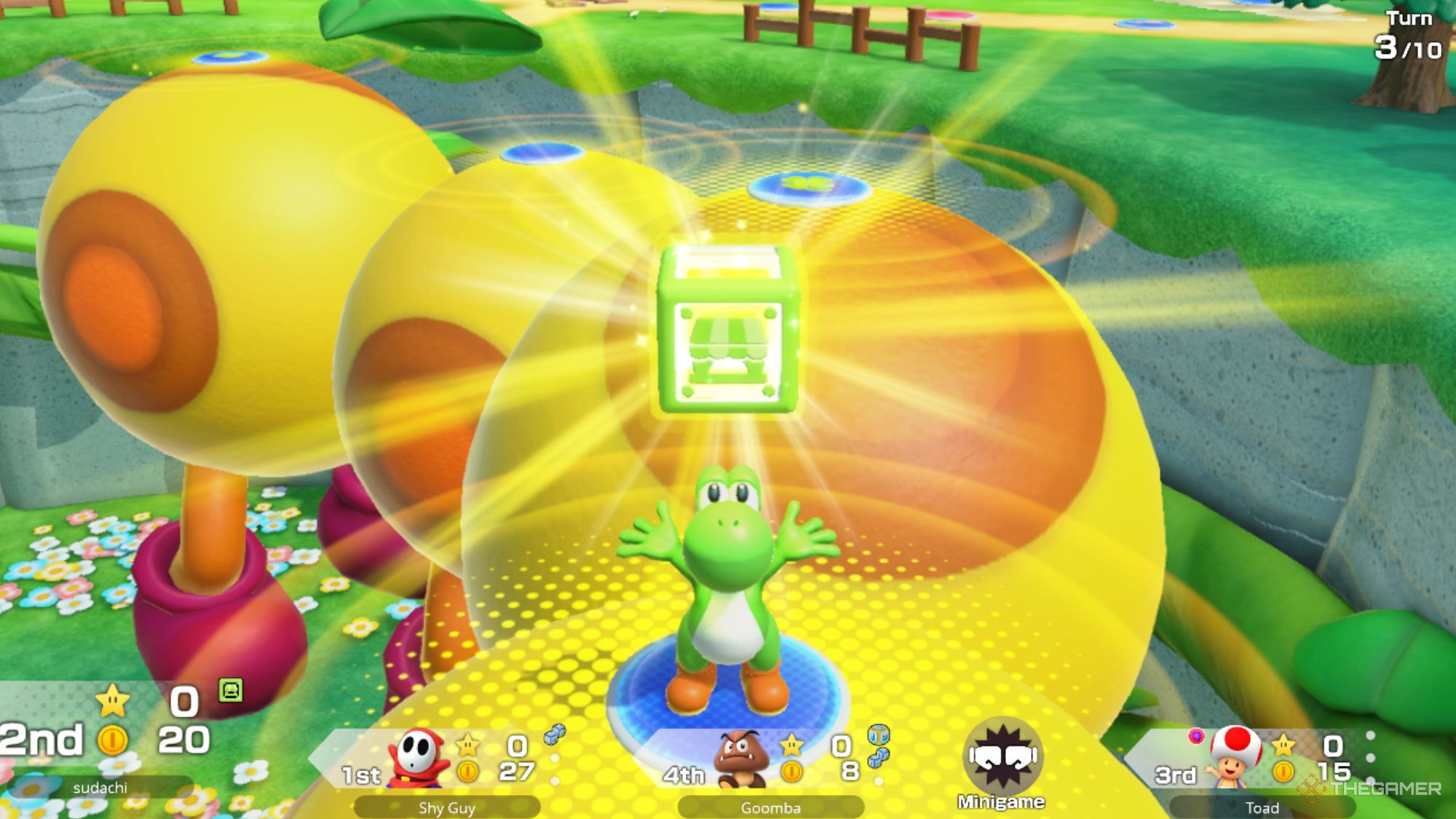 Yoshi Holding Up The Shop Hop Box In Super Mario Party Jamboree.