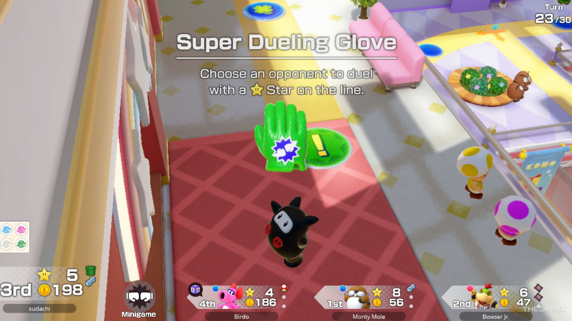 Ninji Holding Up The Super Dueling Glove In Super Mario Party Jamboree.