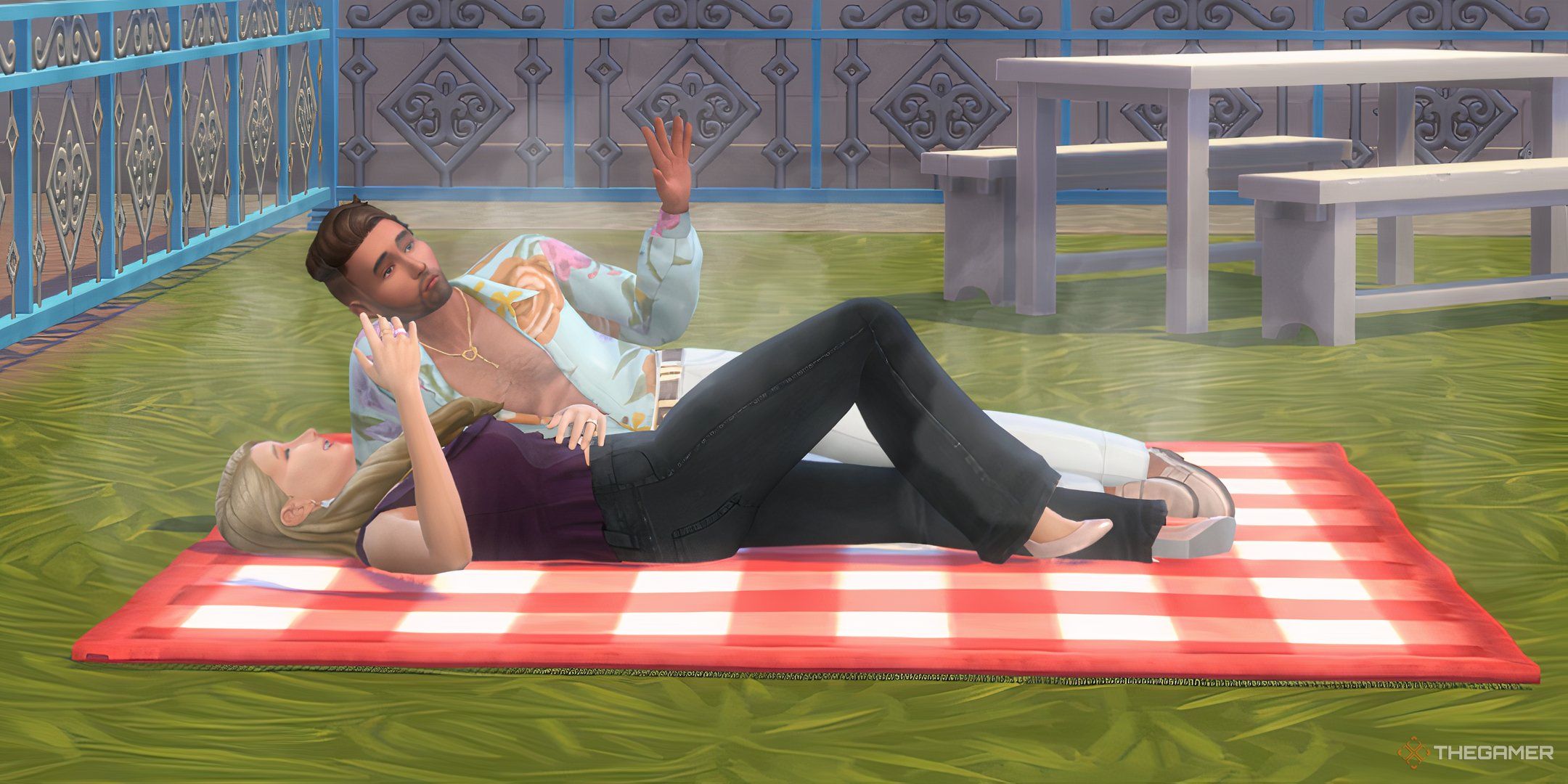 The Sims 4 lovestruck couple on a picnic blanket after woohoo.