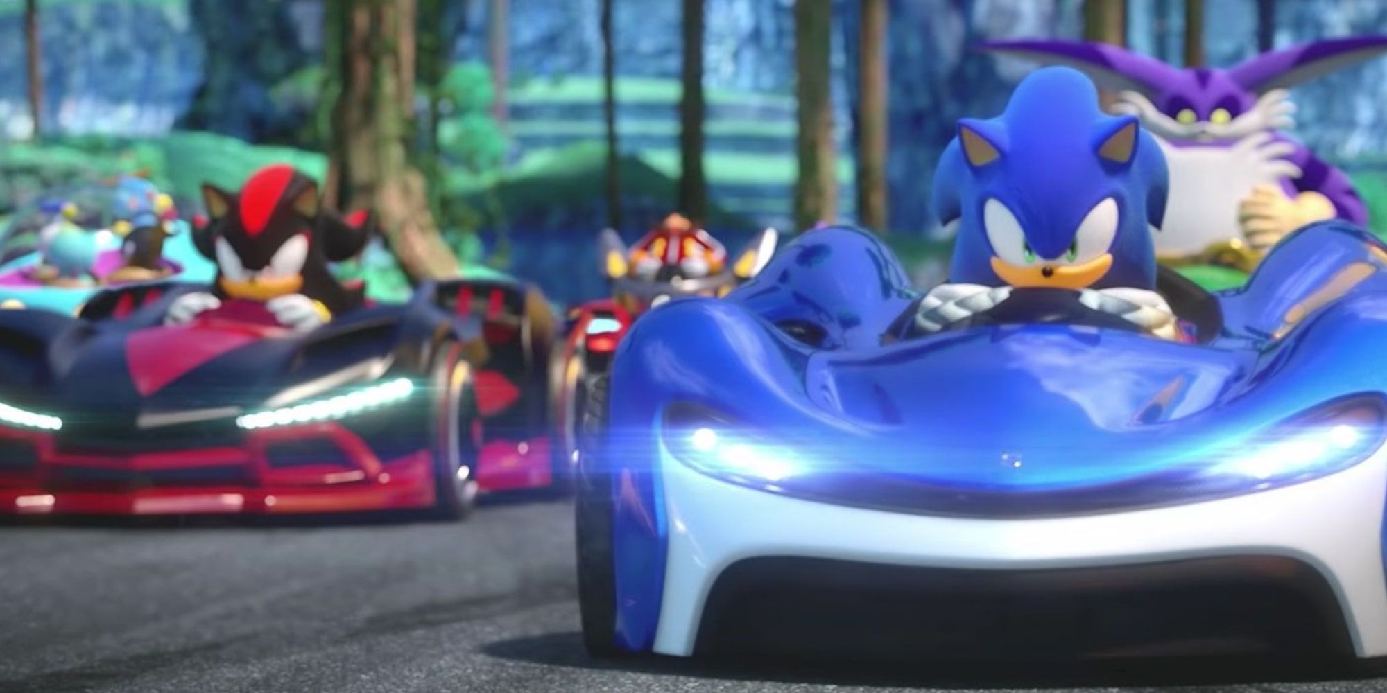 Team Sonic Racing screenshot of Sonic racing down the road with Shadow and Big the Cat behind him.