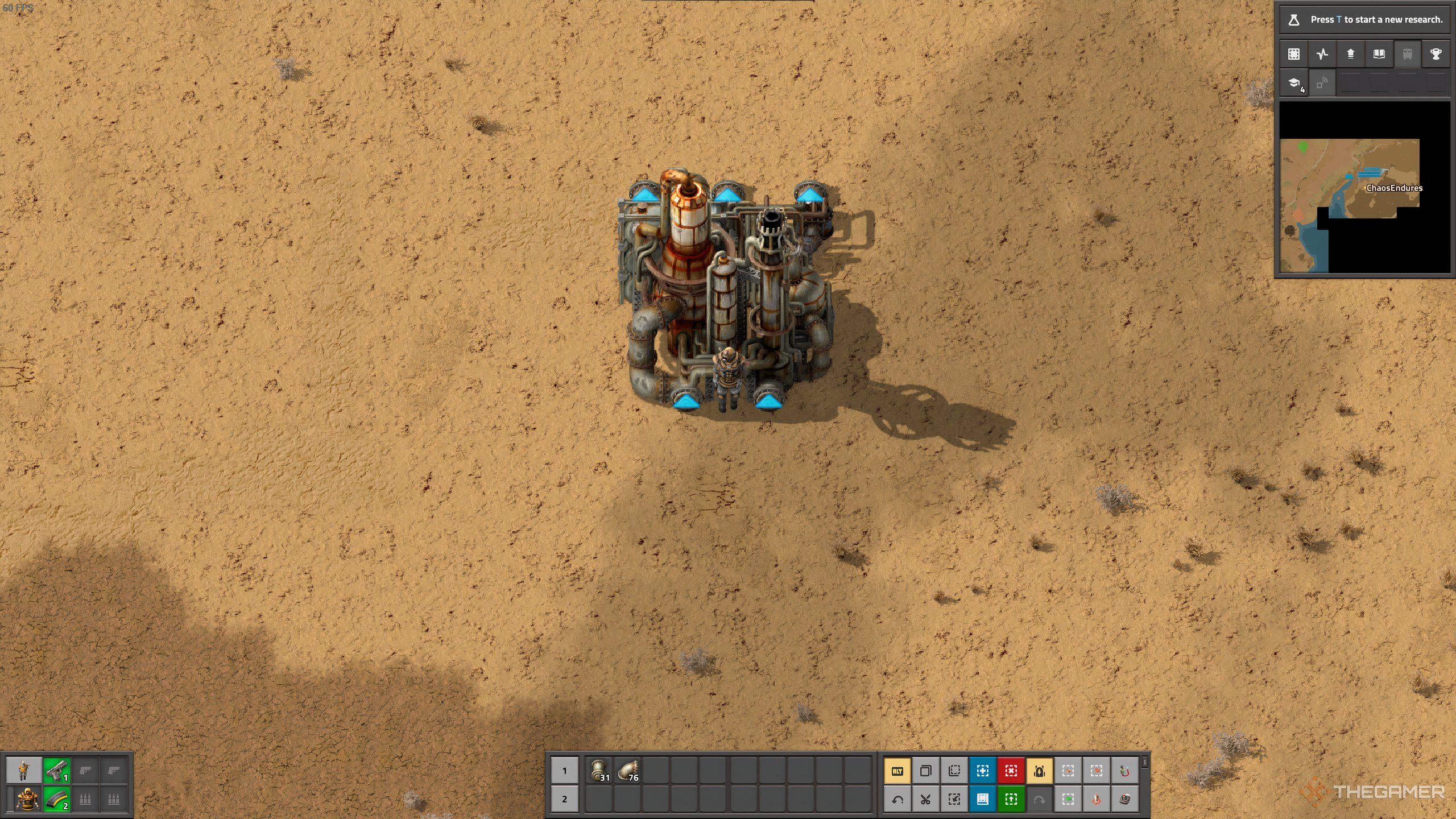 A player standing in front of an oil refinery in Factorio.