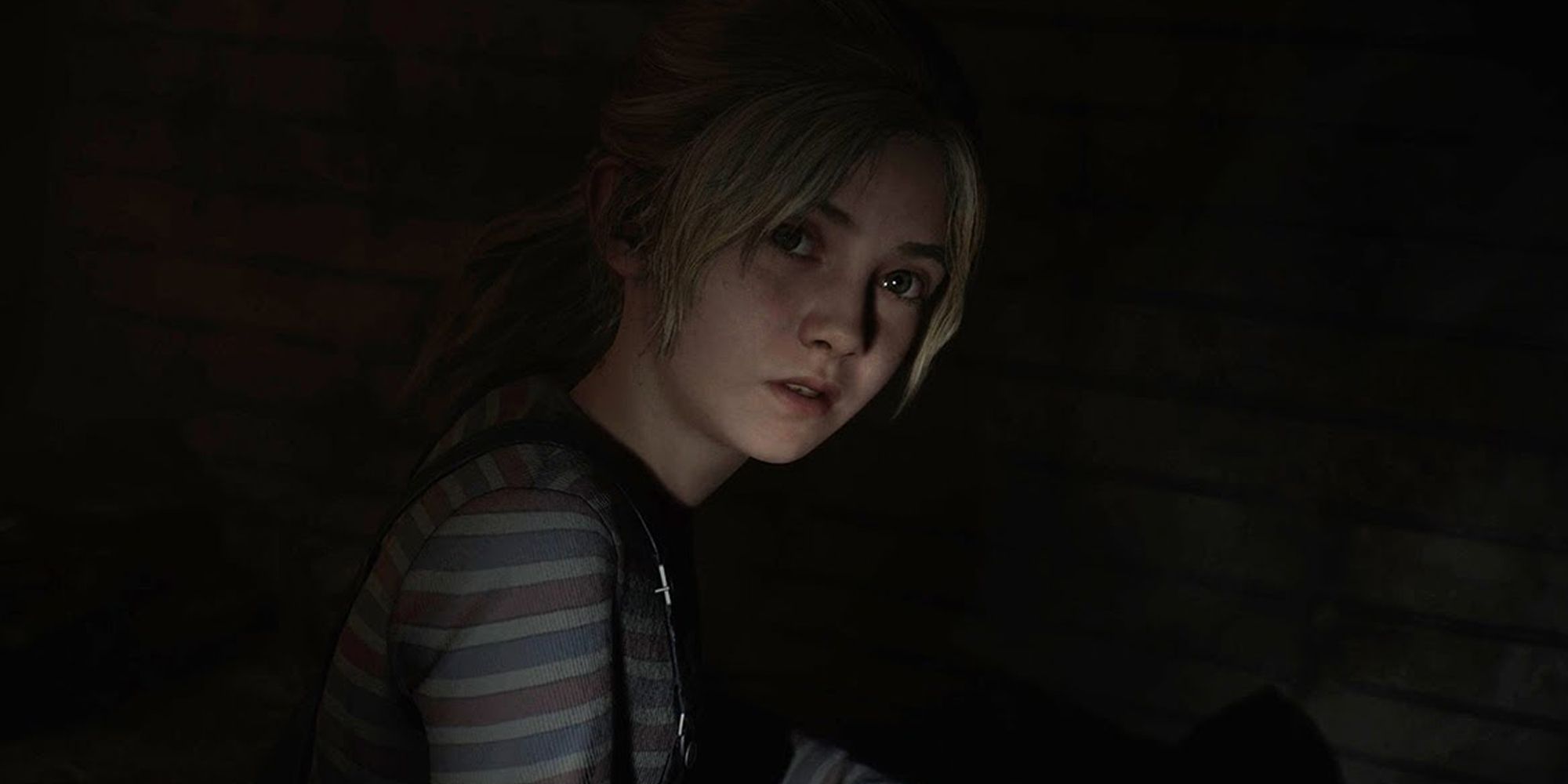 Laura turns to look at James in Silent Hill 2.