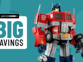 Lego Optimus Prime beside a 'big savings' badge, all against an aqua background