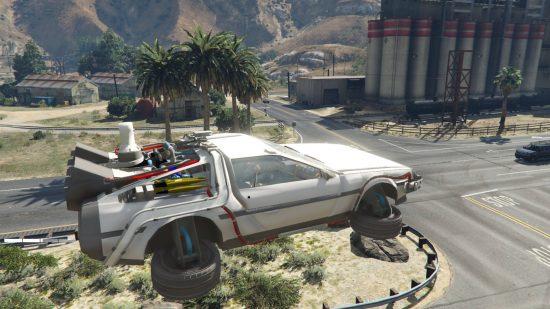 Best GTA 5 mods - the DeLorean is hovering in the sky in Los Santos.