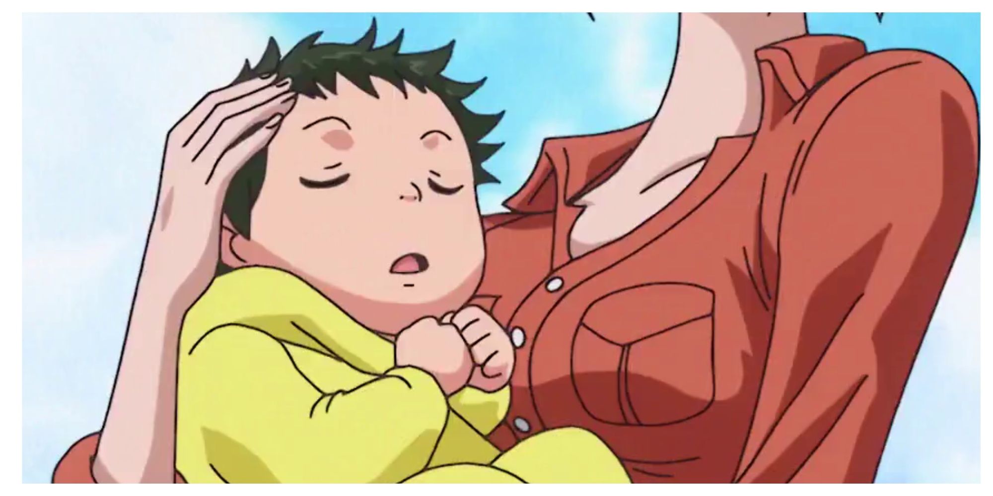 Makino's child being held by their mother