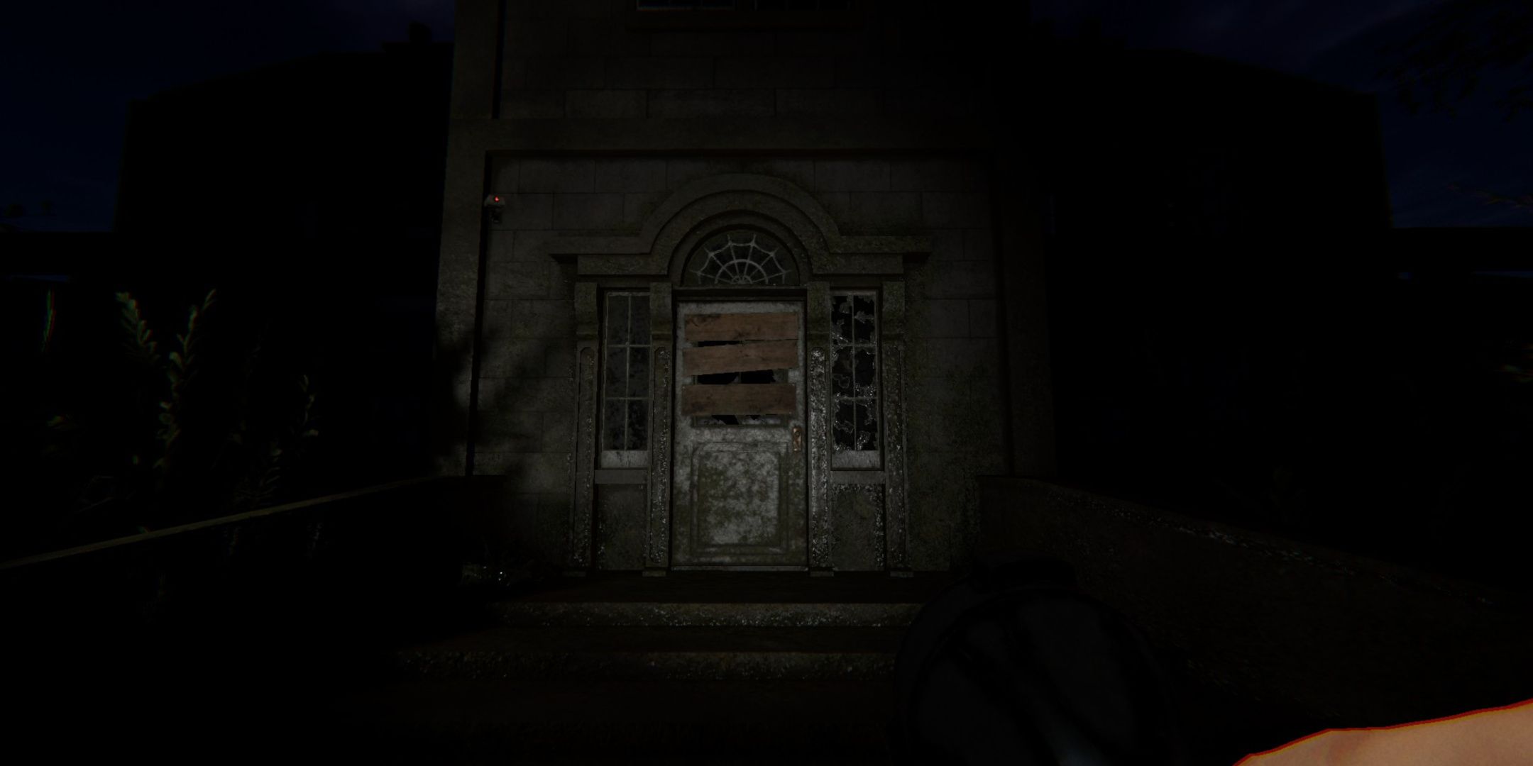 Phasmophobia, the boarded up doorway to the Sunny Meadows Asylum.