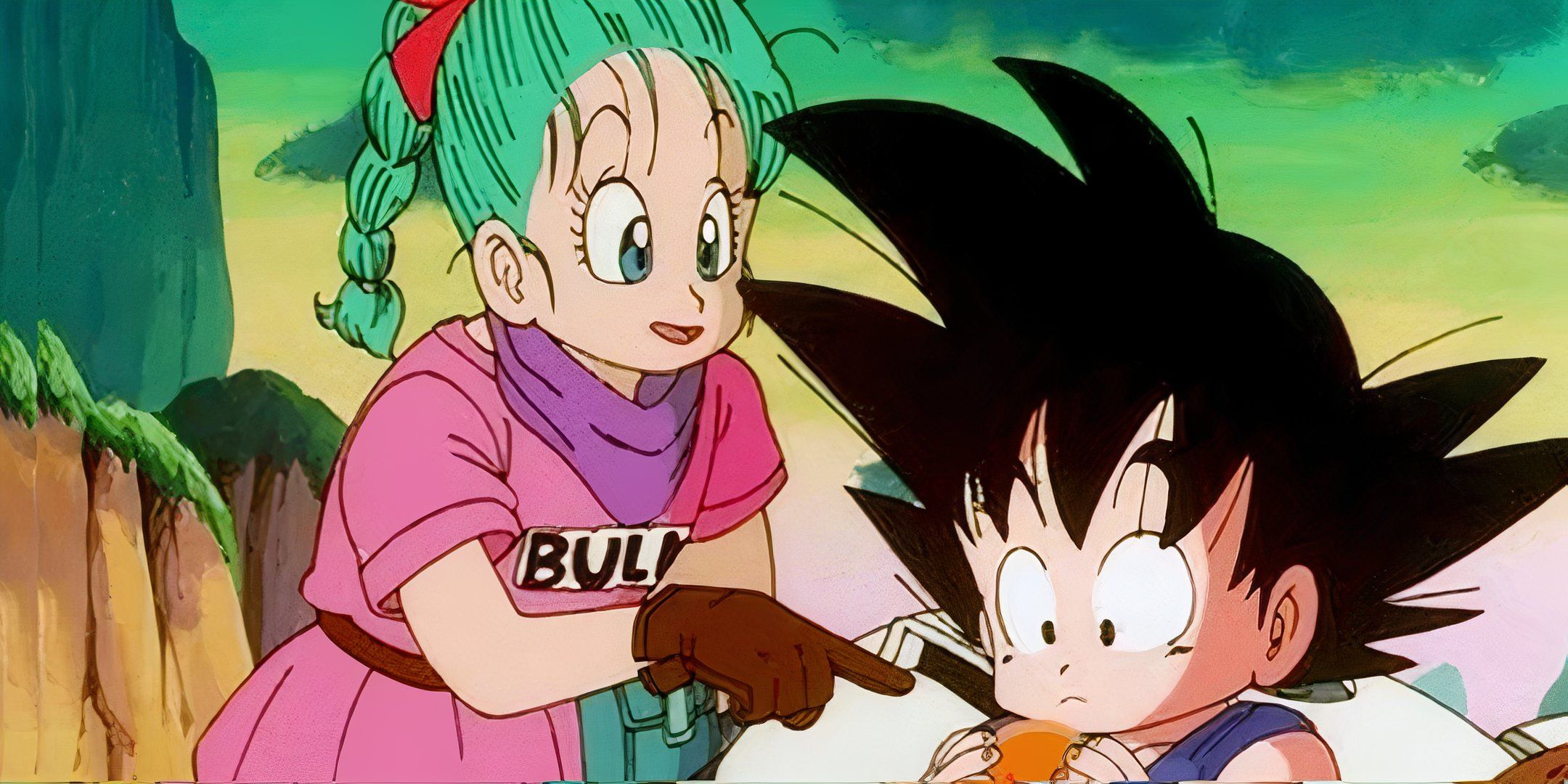 Goku and Bulma point at orange orb