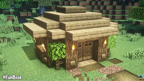 A simple rounded Minecraft house design made from oak wood.