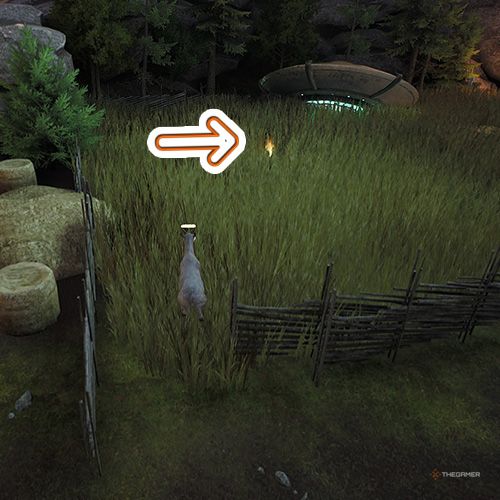 An orange arrow points the trophy that is inside a wheat field with an UFO inside in Goat Simulator Remastered