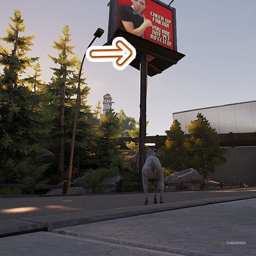 An orange arrow points the trophy that is on top of a red billboard in Goat Simulator Remastered