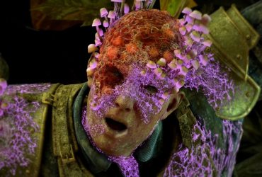 Avowed screenshot showing a corpse-like figure's face with glowing purple mushroom/spore growths