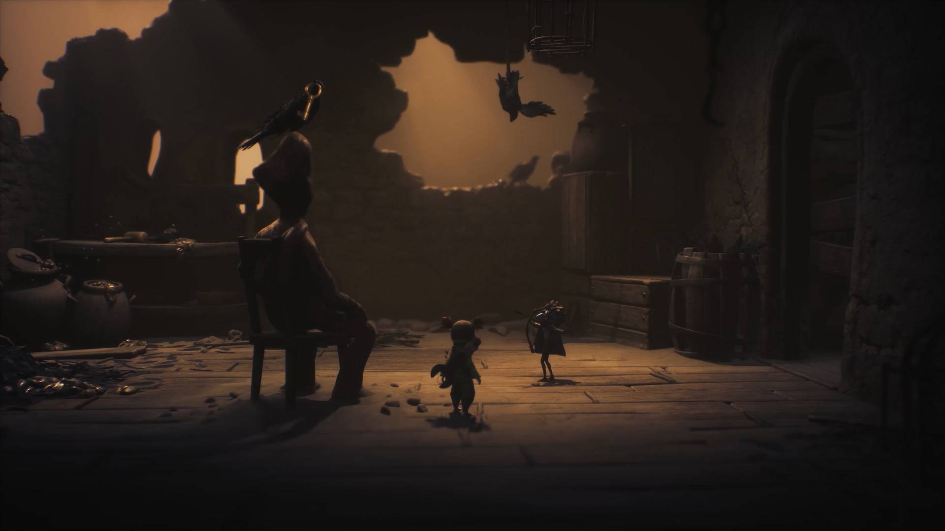 Little Nightmares 3 Necropolis demo low aiming bow at crow holding a key on top of a corpse's head