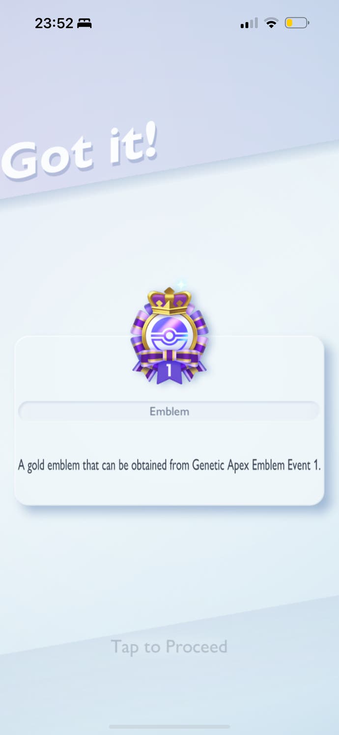 A mobile screenshot of the gold emblem in Pokemon TCG Pocket.