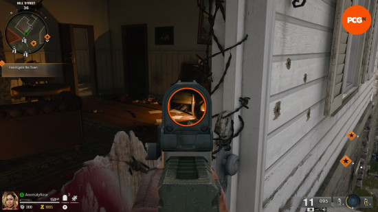 The player aims down sights on a pair of bowling shoes in the front room of the house on Hill Street, part of the BO6 Liberty Falls bowling alley easter egg.