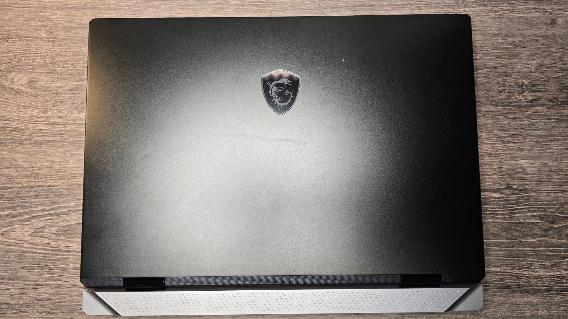 MSI Titan 18 HX gaming laptop review image showing the laptop closed.