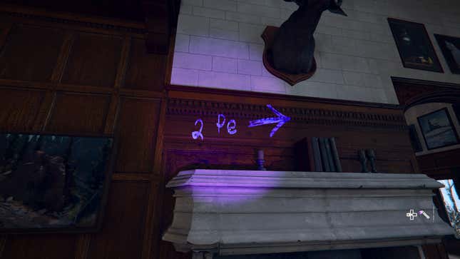 A purple light is beamed at a wall, revealing a message saying “2 PE” and an arrow next to it.