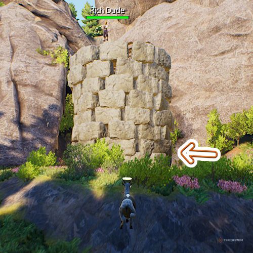 An orange arrow points the entrance of a primal tower and there is a NPC on it in Goat Simulator Remastered