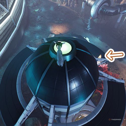 An orange arrow points the trophy that is on the platform which is attaches to capsule shaped building in Goat Simulator Remastered