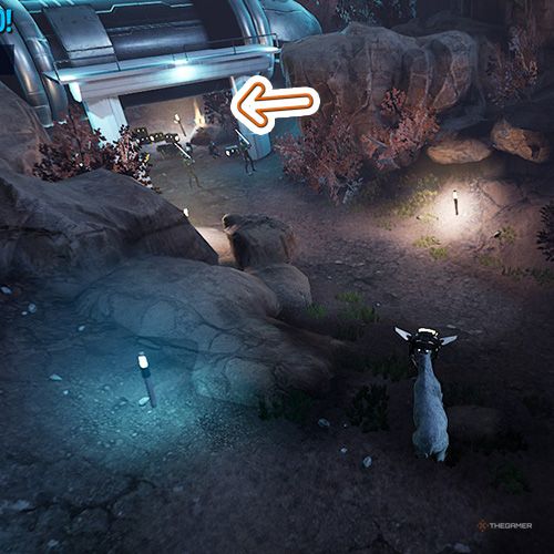 An orange arrow points the trophy that is under a metallic object and it is guarded by three people in Goat Simulator Remastered