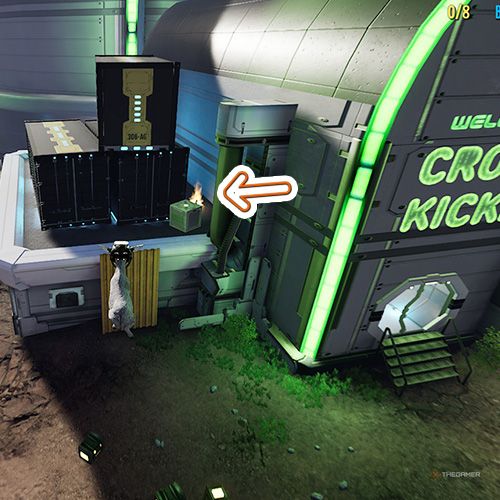 An orange arrow points the trophy that is on the roof of the Crowdkicker building in Goat Simulator Remastered