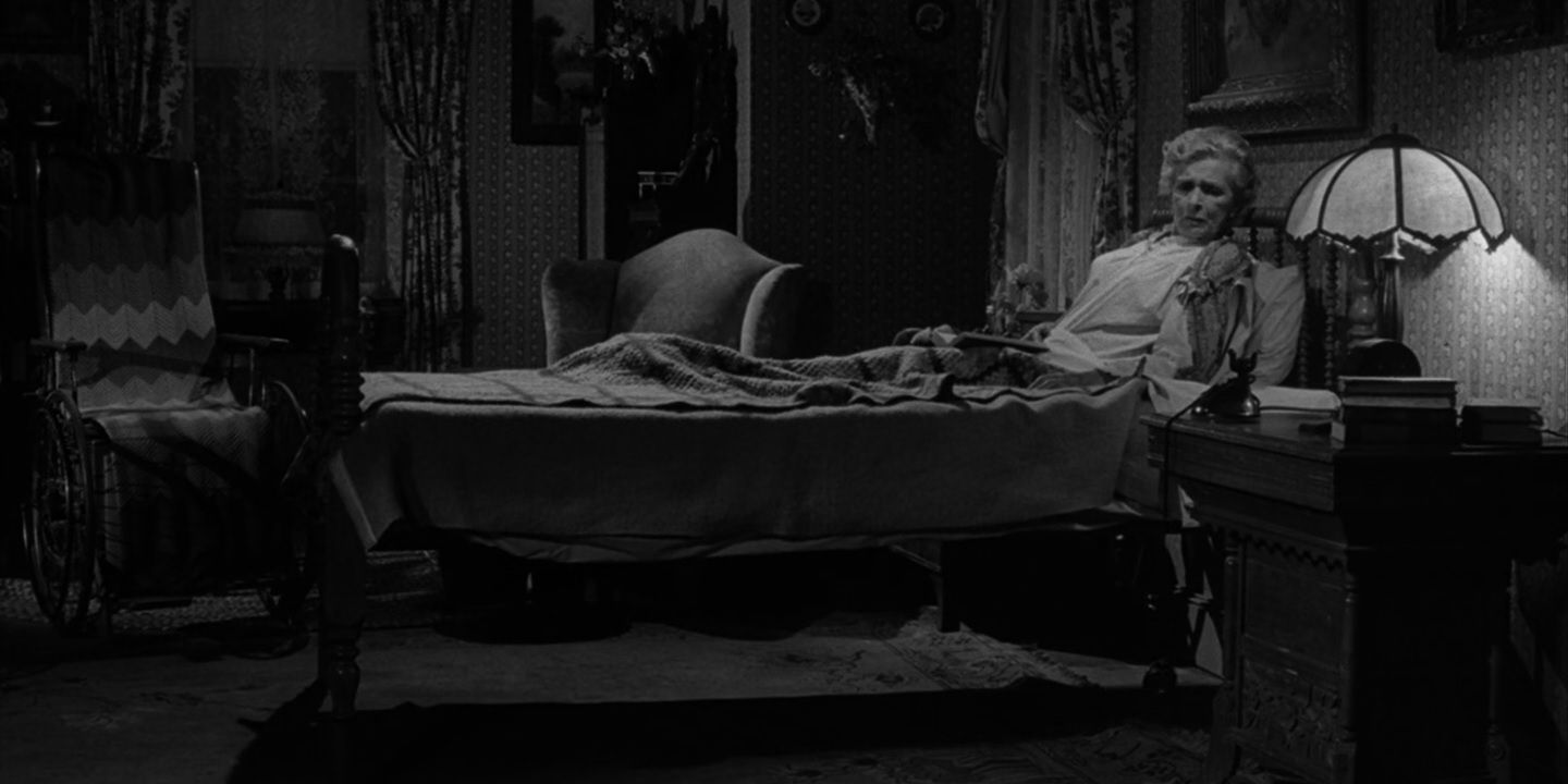 An old woman sits in bed in The Twilight Zone episode "Night Call".