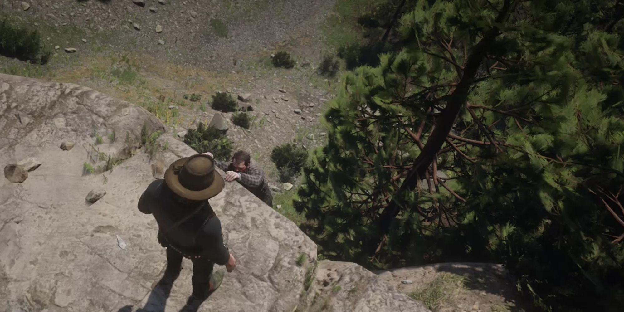 Red Dead Redemption 2 Screenshot of the man from Blackwater hanging from a cliff while Arthur stands over him.