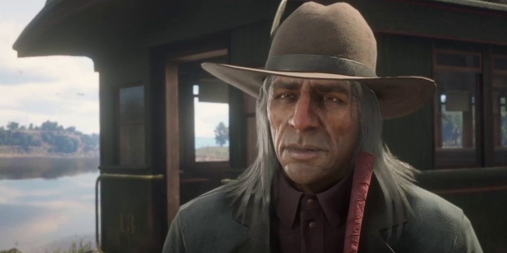 Rain Fall speaking in front of a train car in Red Dead Redemption 2 the video game.