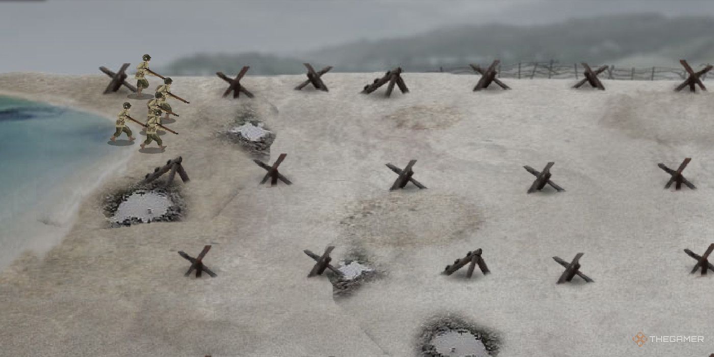 A group of foot soldiers marches across Normandy Beach in Warfare 1944.