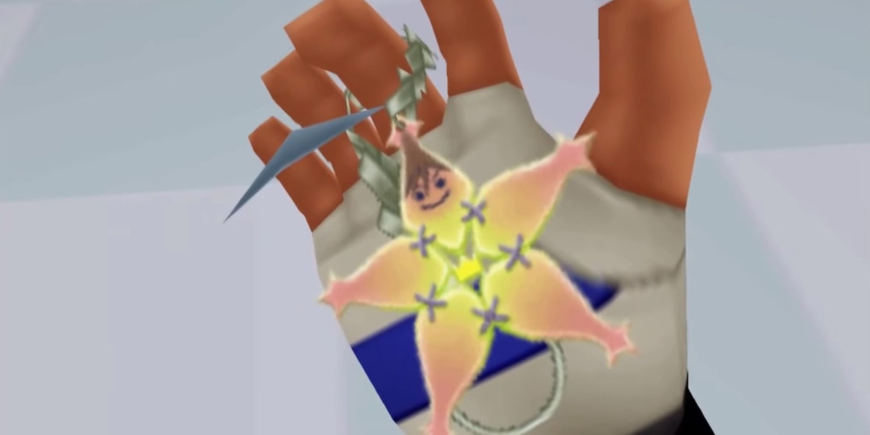 Sora holding the transformed charm in Kingdom Hearts Re Chain of Memories.