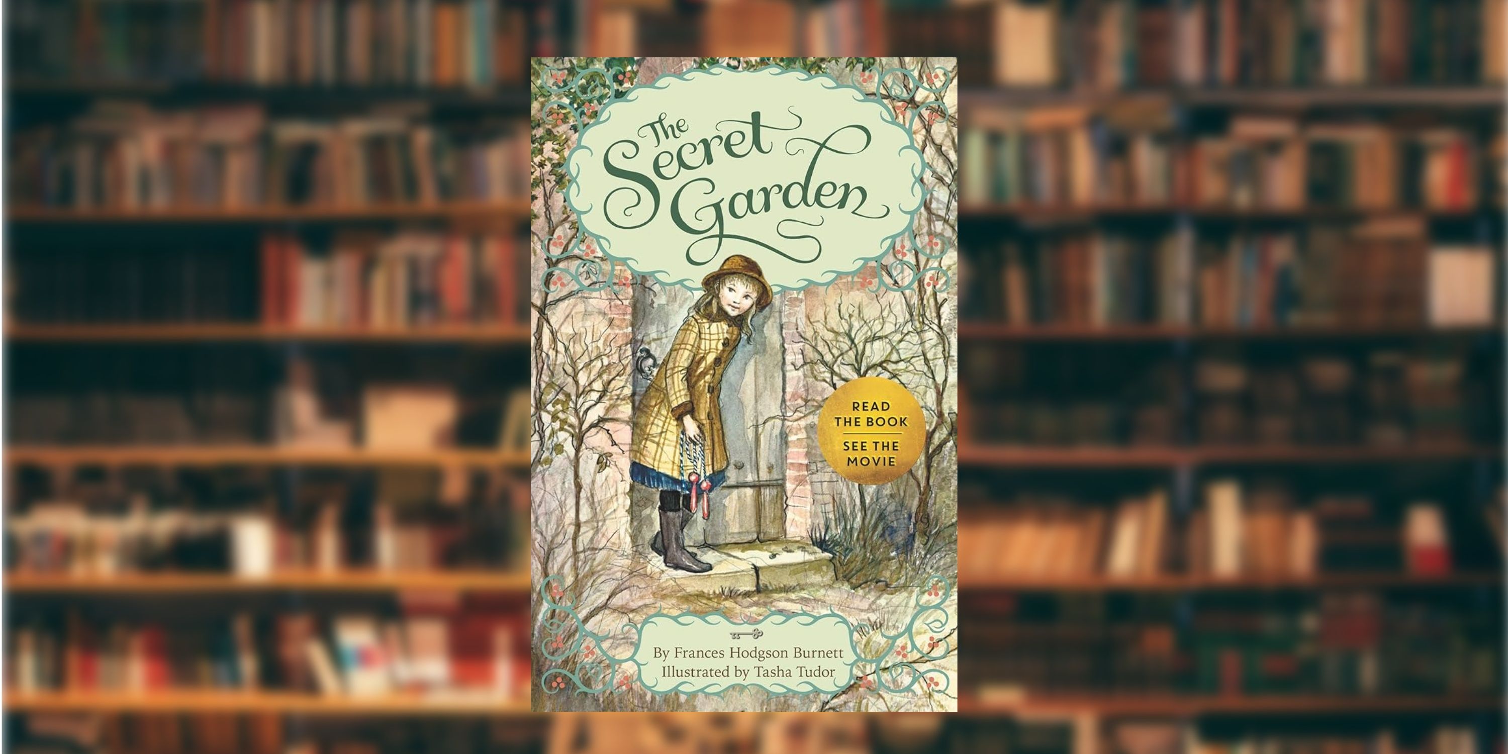 The Secret Garden book in front of a blurred library wall. 