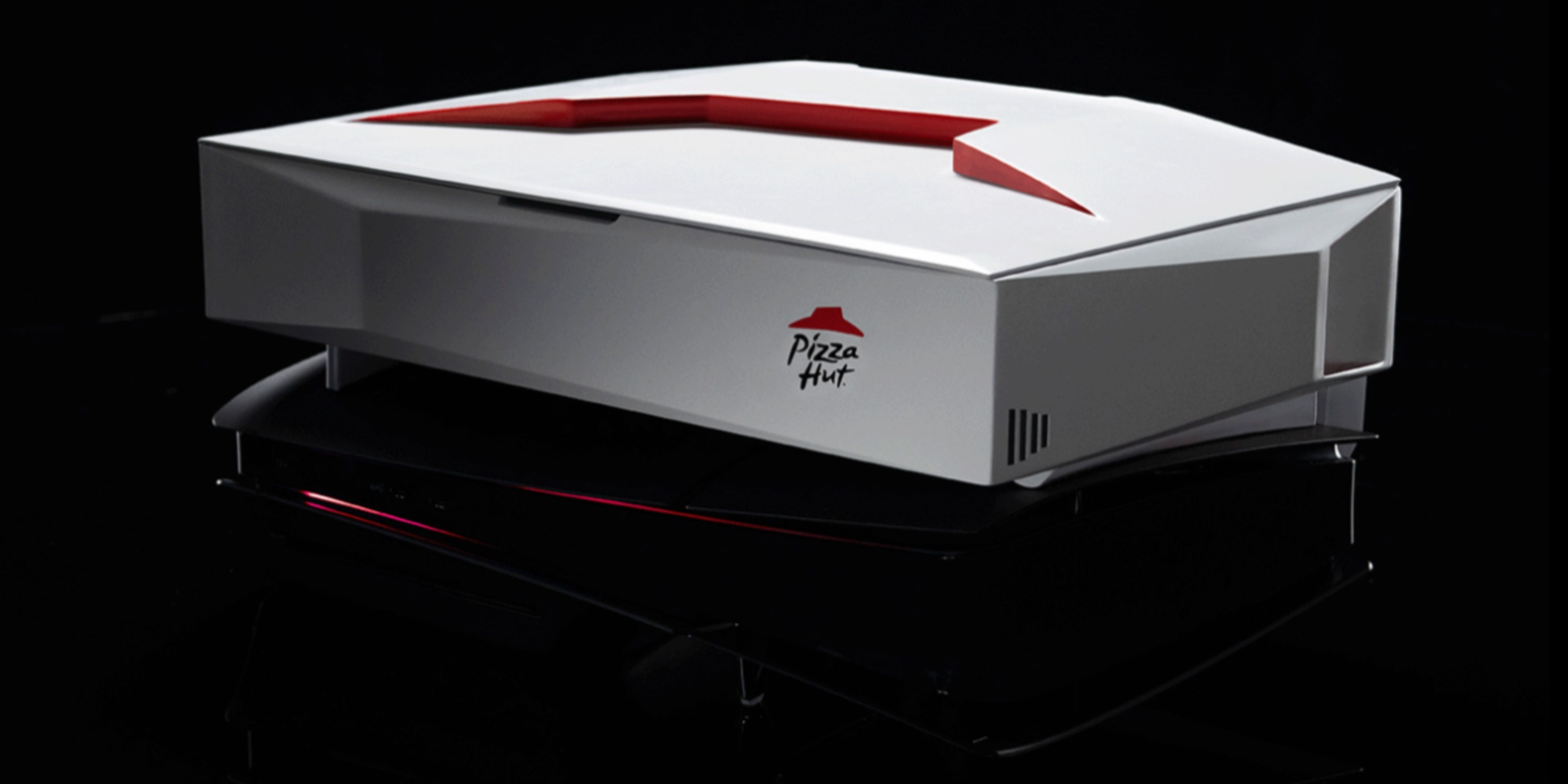 pizza hut pizza warmer sitting on top of a ps5.