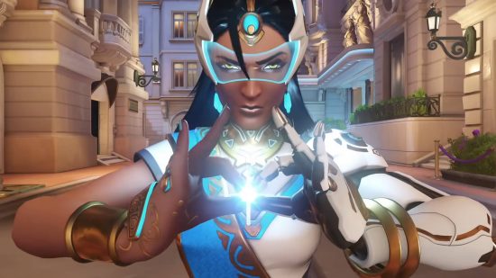 Overwatch 2 tier list: Symmetra is channeling light in her fingers.