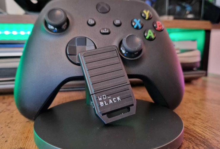 WD Black C50 Xbox storage card leaning on a Series X controller