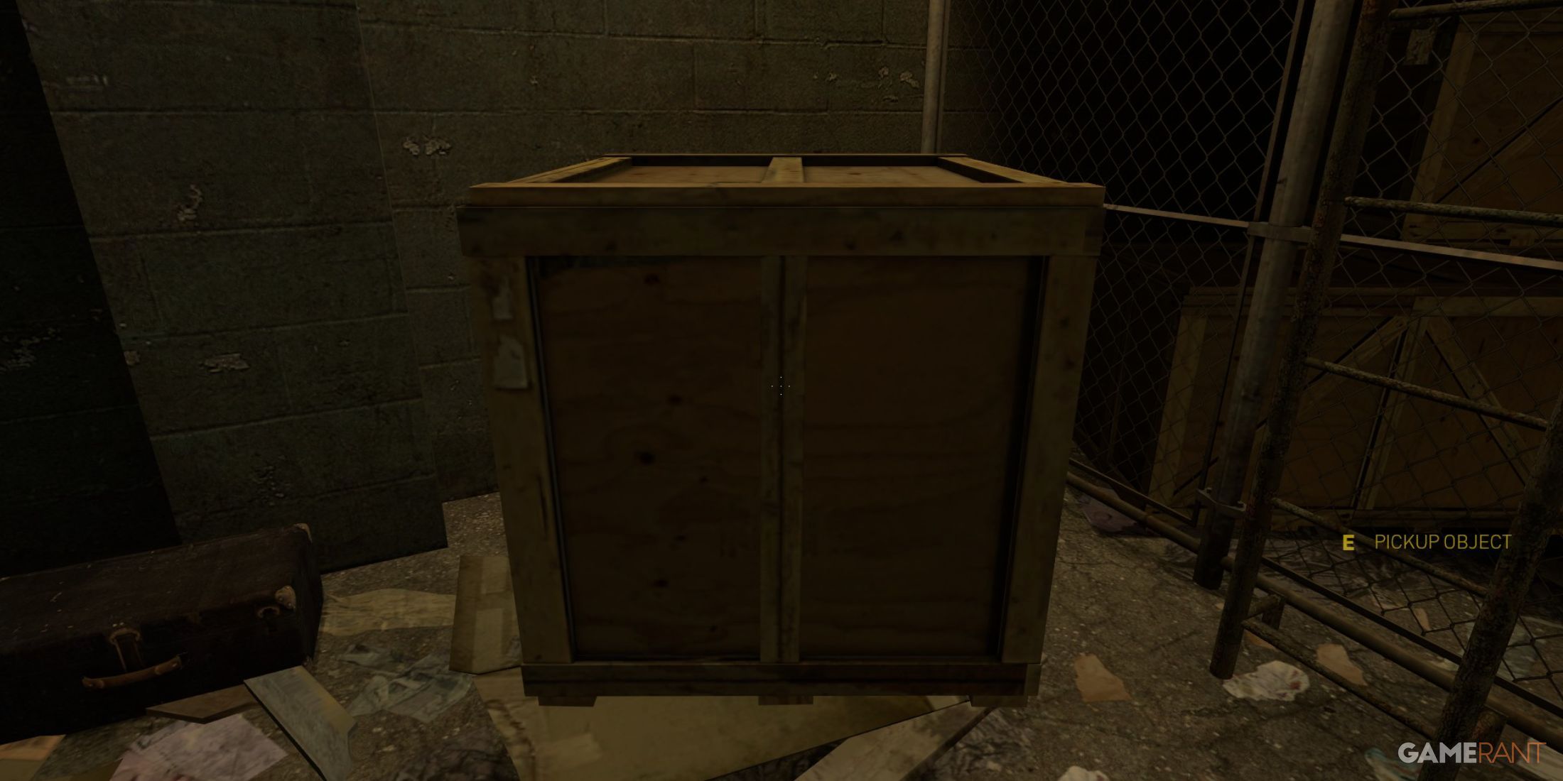 A wooden crate in a dimly lit storage area in Half-Life 2