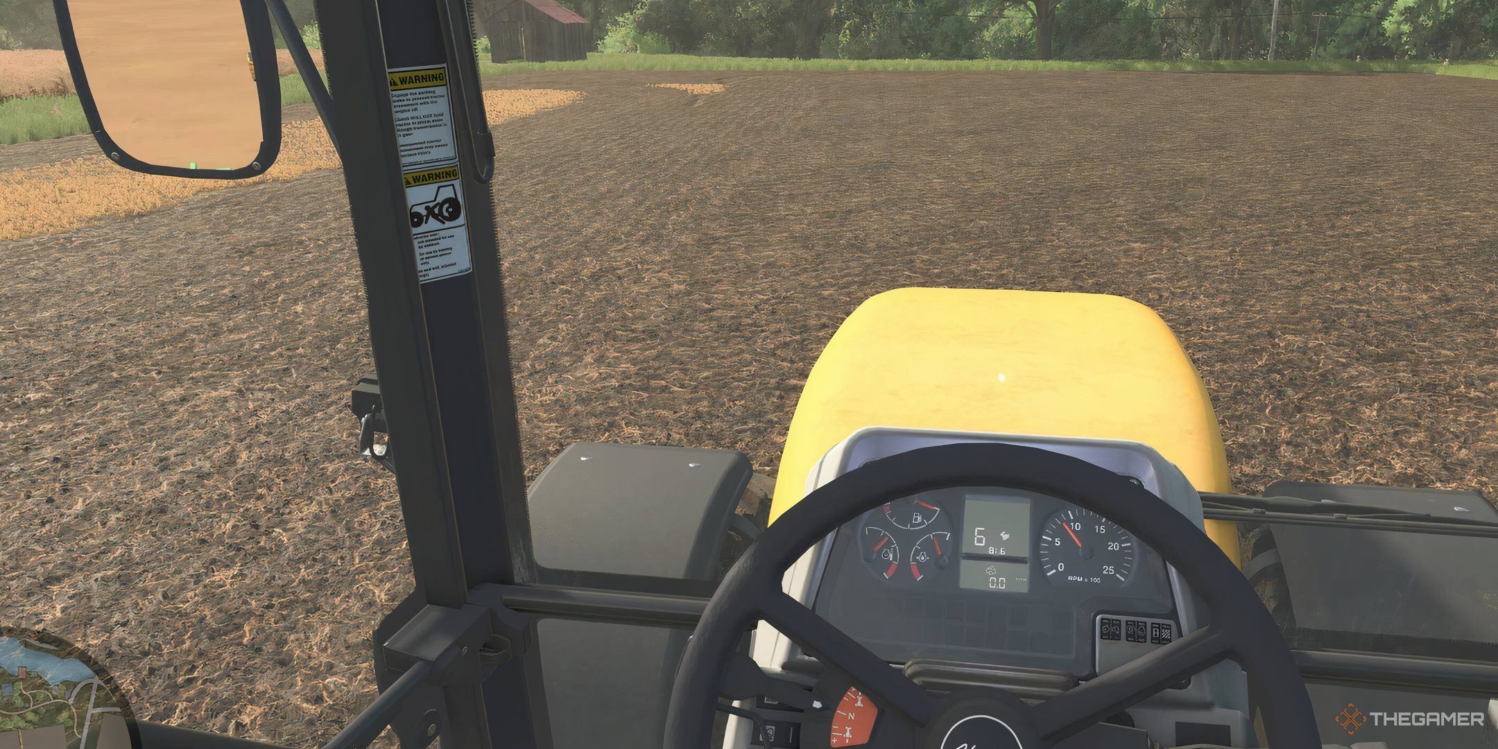 The first-person view for driving a tractor in Farming Simulator 25