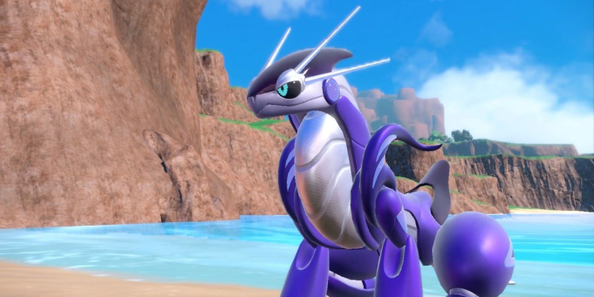 Miraidon floating on the beach in Pokemon Scarlet and Violet.