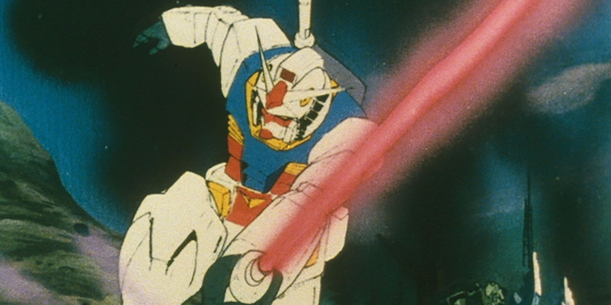 A blue, yellow, white, and red mech (the RX-78-2 Gundam) swings a red beam saber in Gundam '79