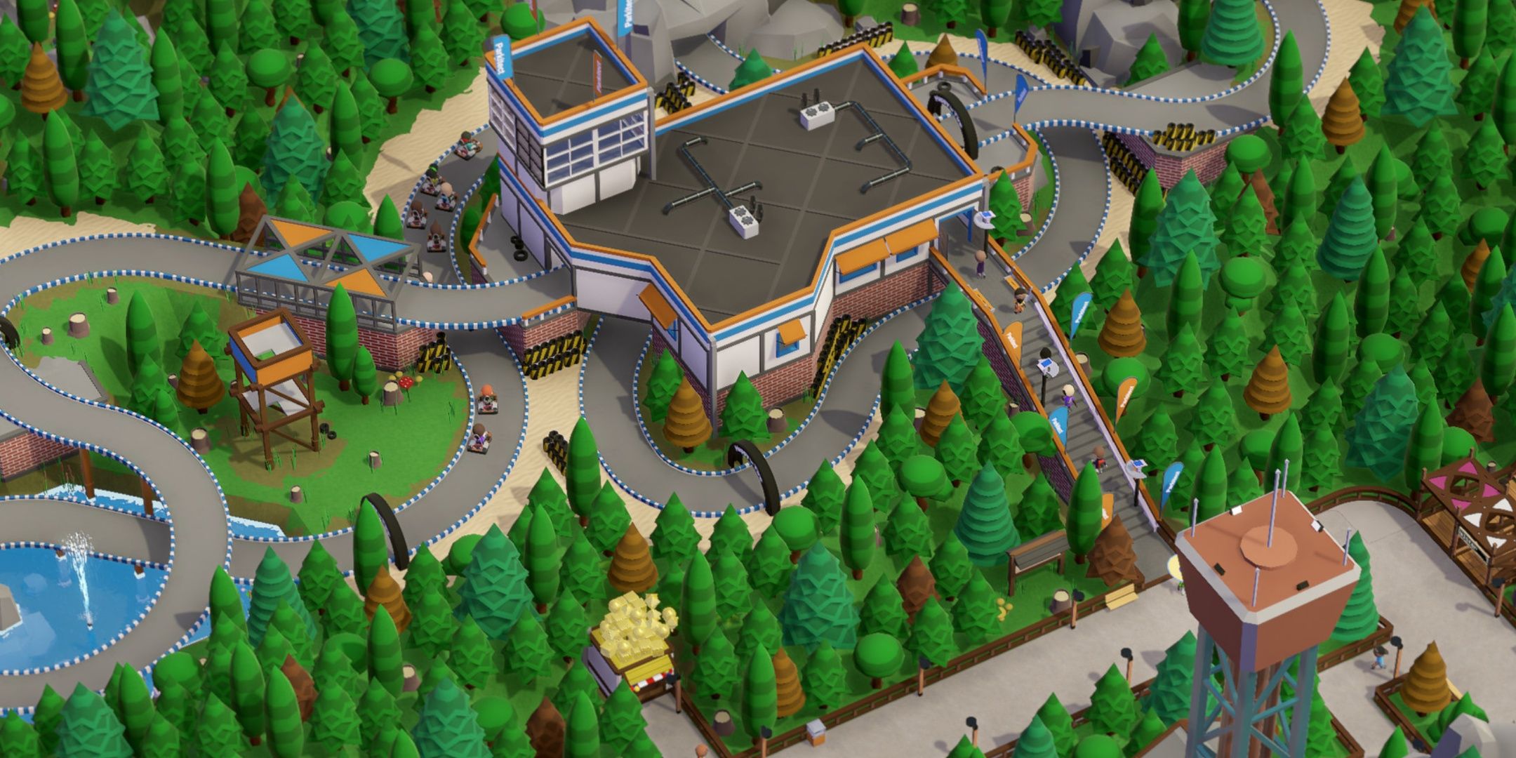 An overhead view of a park in Parkitect.